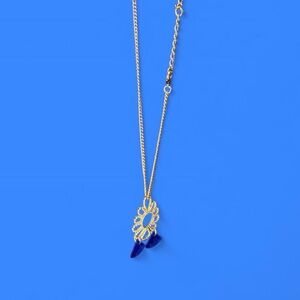 Silvertone flower necklace with blue stones